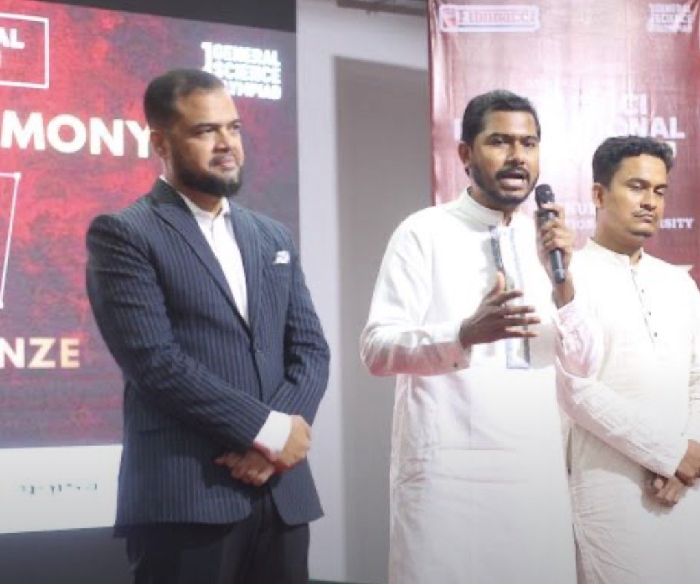 Muhammed Mehdi Hasan Chowdhury on stage at the Olympiad award ceremony