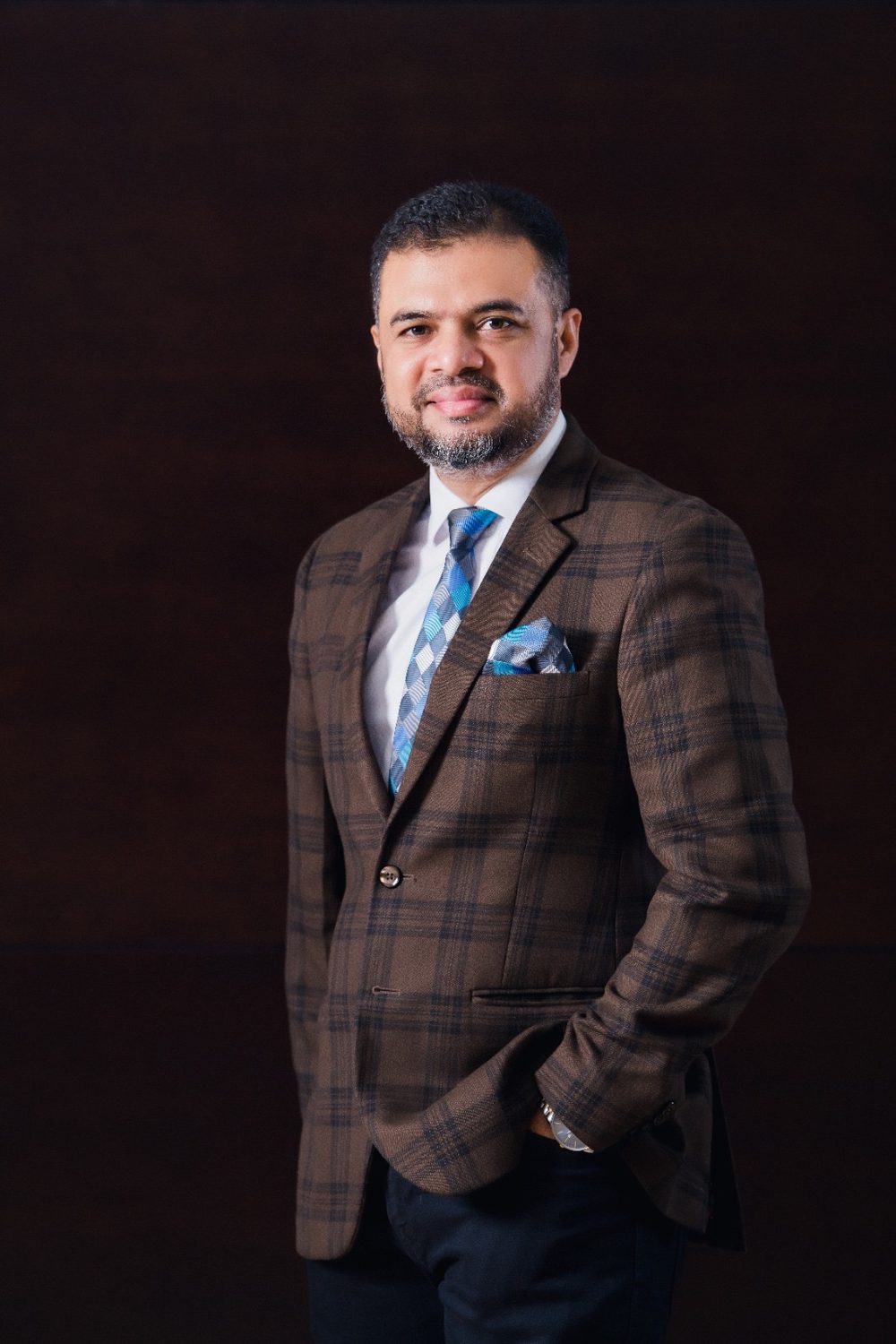 Muhammed Mehdi Hasan Chowdhury in a business portrait